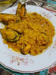 Una foto de Arroz con mejillones y Ali oli