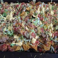 A picture of Triple Blazing Hot Loaded Nachos.