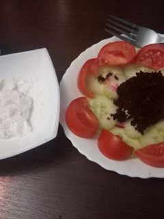 A picture of Salad Varier with cottage cheese dip.