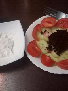 A picture of Salad Varier with cottage cheese dip.