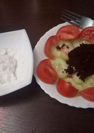 A picture of Salad Varier with cottage cheese dip.
