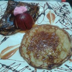 A picture of Eggless nutrella filled pancakes.