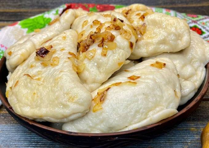 Вареники дріжджові з квашеною капустою та грибами/Рецепт пухких вареників