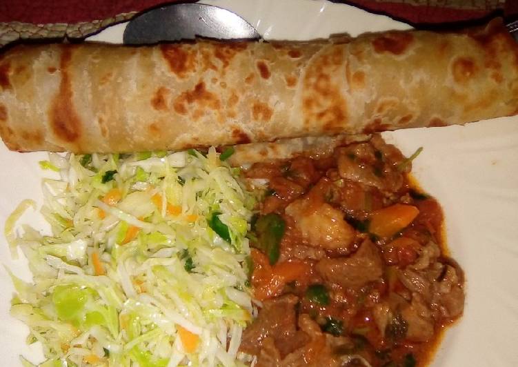 Chapati served with beef and steamed cabbage