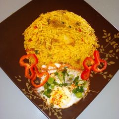 Stir fried rice with minced meat and sunny side up egg A picture of Stir fried rice with minced meat and sunny side up egg.