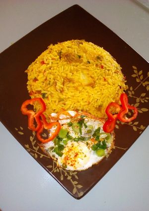 A picture of Stir fried rice with minced meat and sunny side up egg.