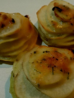 Una foto de Milhojas de patata con parmesano