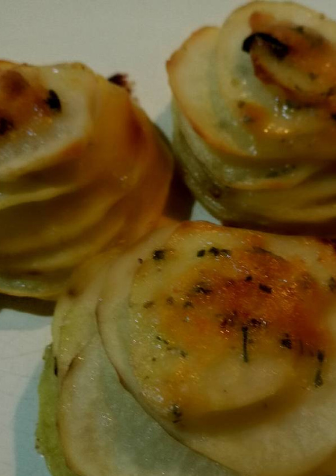 Una foto de Milhojas de patata con parmesano