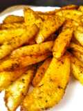 Gajos de patatas especiados, al horno
