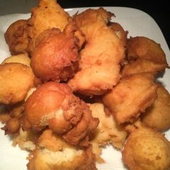 A picture of Doughnuts with milk.