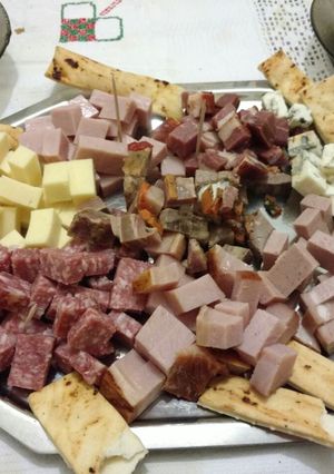Una foto de Picada cargadita
