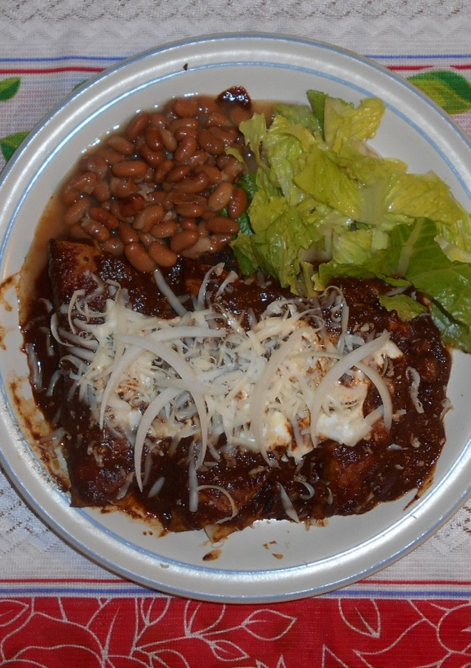 Una foto de Enmoladas de pollo