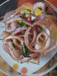 A picture of Laccha Onion Salad.