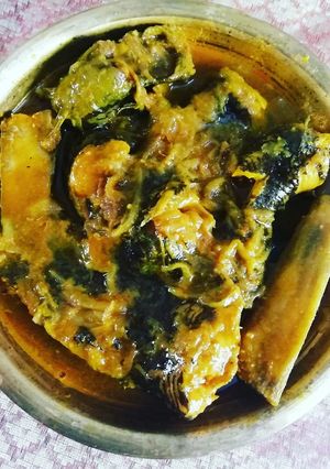 A picture of Fresh water catfish curry with raw banana.