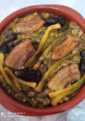 Foto principal de Arroz al horno con habas y alcachofas
