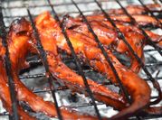 Una foto de calamares en salsa