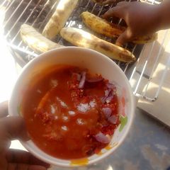 A picture of Rosted plantain and stew.