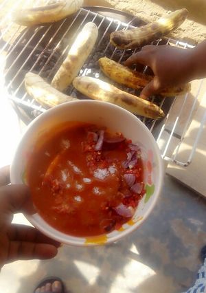 A picture of Rosted plantain and stew.