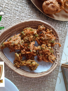 A picture of Mix OPC pakora 🧅🥔🌶.