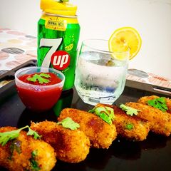 A picture of Potato and veggie kababs.