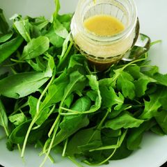 A picture of Lime vinaigrette for rocket and spinach salad.