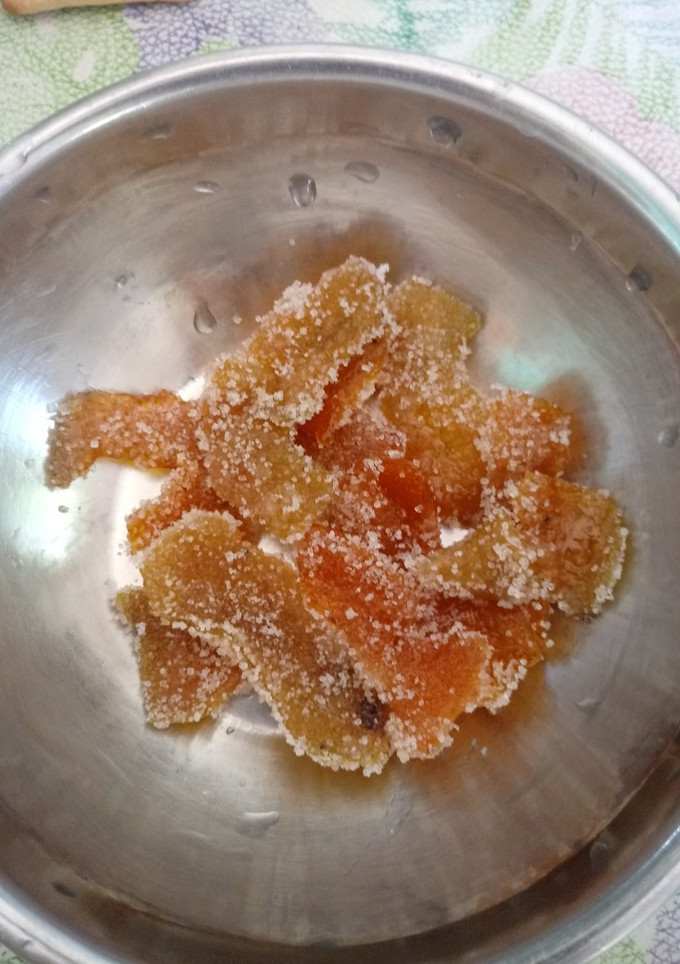 Una foto de Cascaritas de naranja confitadas