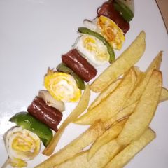 A picture of Potatoes and egg kebab.