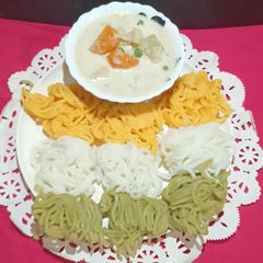 A picture of Idiyappam With Vegetable Stew.