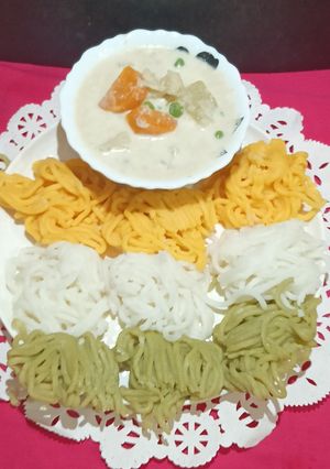 A picture of Idiyappam With Vegetable Stew.