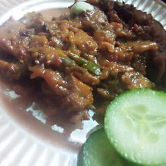 A picture of Baigan ka bharta with roti.