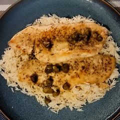 A picture of E!'s Chicken Piccata with Capers.