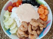 Una foto de mariscos en salsa de tomate