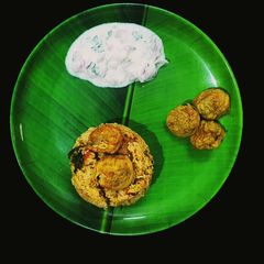 A picture of Seeraga samba egg paniyaram biryani.