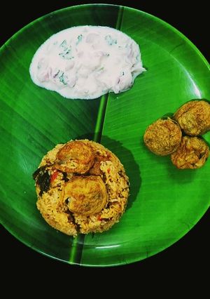 A picture of Seeraga samba egg paniyaram biryani.