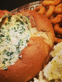 A picture of Bacon and spinach cob loaf.