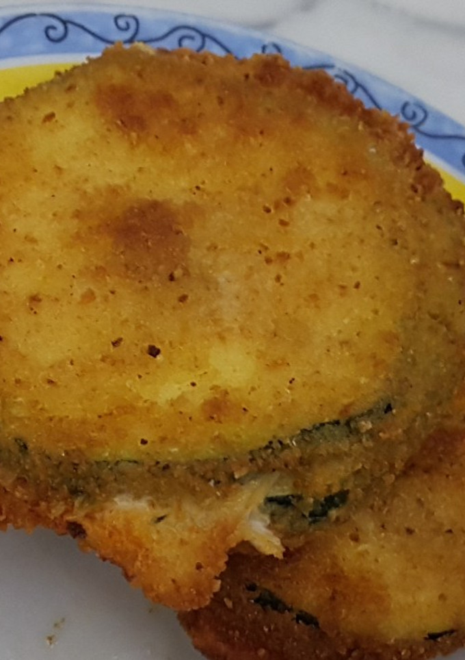 Una foto de Montaditos de calabacín