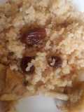 Arroz con pollo, canela y pasas