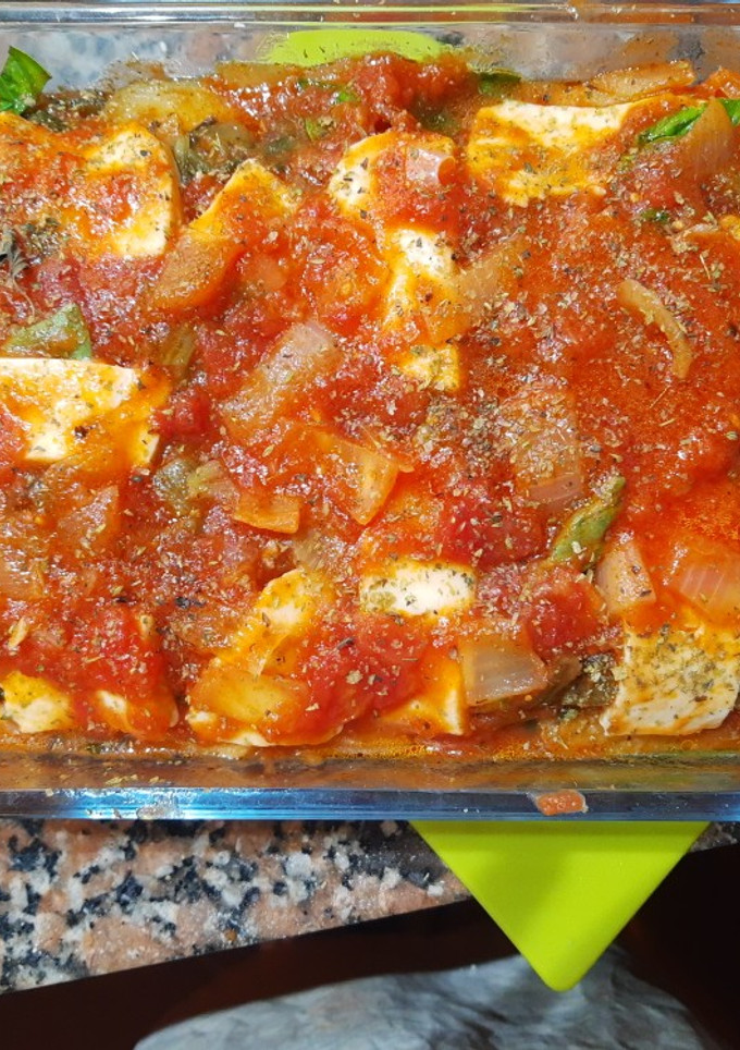 Una foto de Berenjenas a la parmesana con pencas de acelga🤗