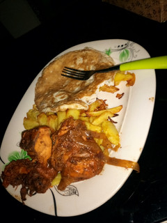 A picture of Grilled chicken with arish and egg.