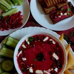 A picture of Roasted beetroot and garlic hummus with olive oil toasted bread.