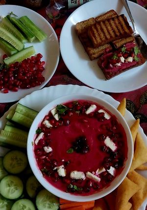 A picture of Roasted beetroot and garlic hummus with olive oil toasted bread.