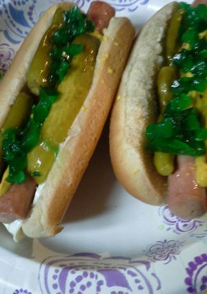A picture of Vienna sausages on a bun.