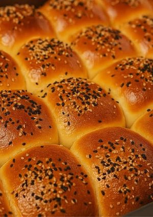 A picture of Coconut Sesame Seeds Dinner Rolls.