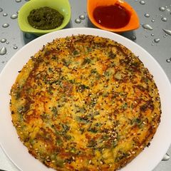 A picture of Besan Suji Uttapam With Methi Leaves.