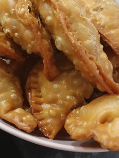 Una foto de Empanadillas de queso y cebolla caramelizada