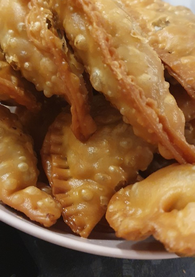 Una foto de Empanadillas de queso y cebolla caramelizada