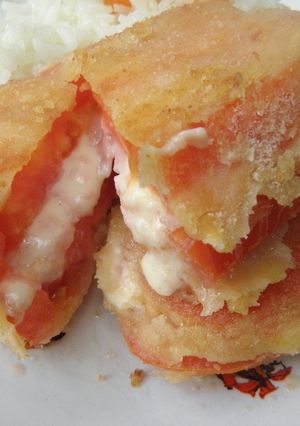 Una foto de Sandwich tibio de tomate