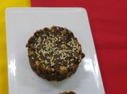Una foto de pan de higo con almendras