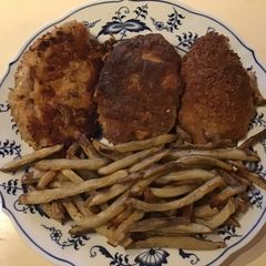 A picture of California Farm Pork Loin with French Fries.
