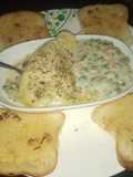 Potato baked dish with garlic bread
